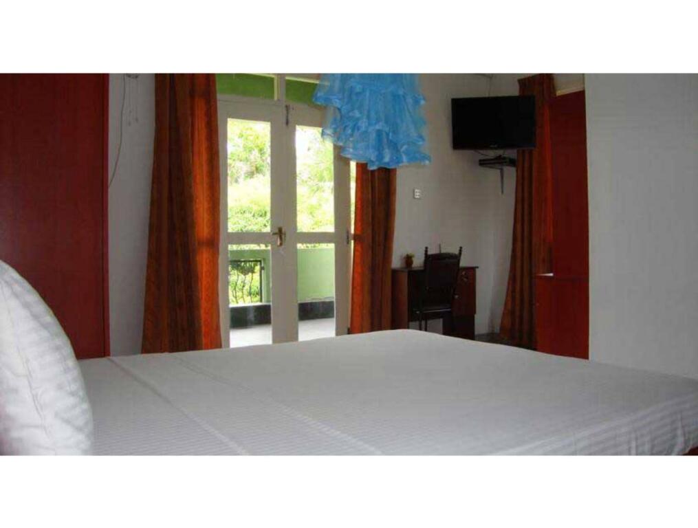 Калкудах: Nandawanam Guest House