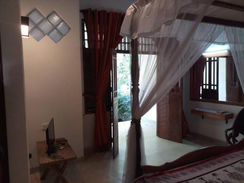 Канди: ambasewana Bungalow