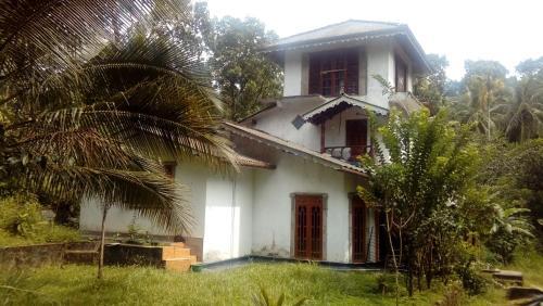 Гинигатена: Hermitage Homestay