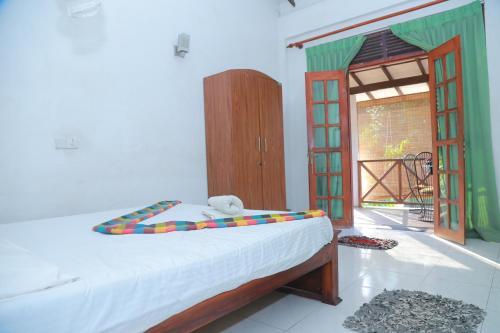 Бентота: Rivelco Holiday Inn