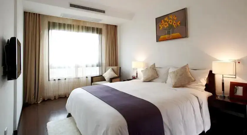 Уси: Belgravia Serviced Residence Apartment