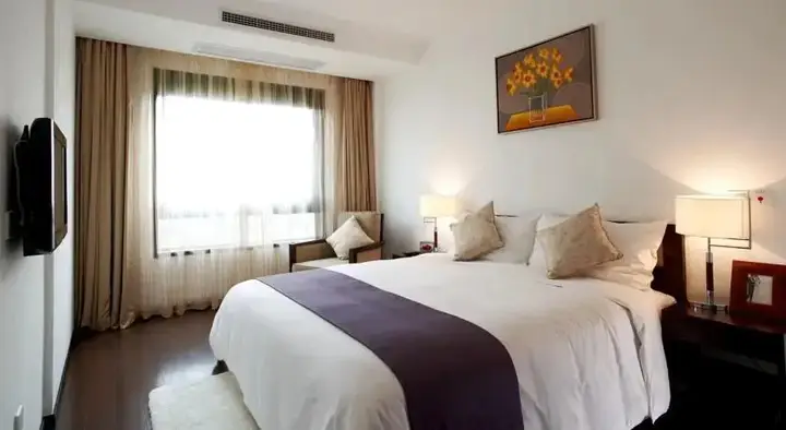 Уси: Belgravia Serviced Residence Apartment