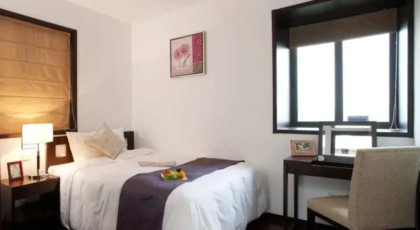 Уси: Belgravia Serviced Residence Apartment
