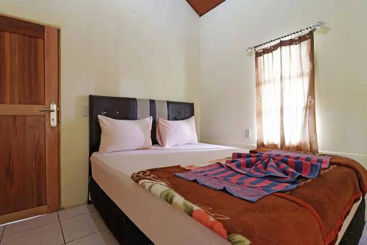 Озеро Тоба: Tuk Tuk Timbul Bungalows