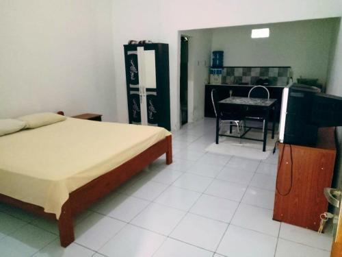 Матарам: Sayang Guest House