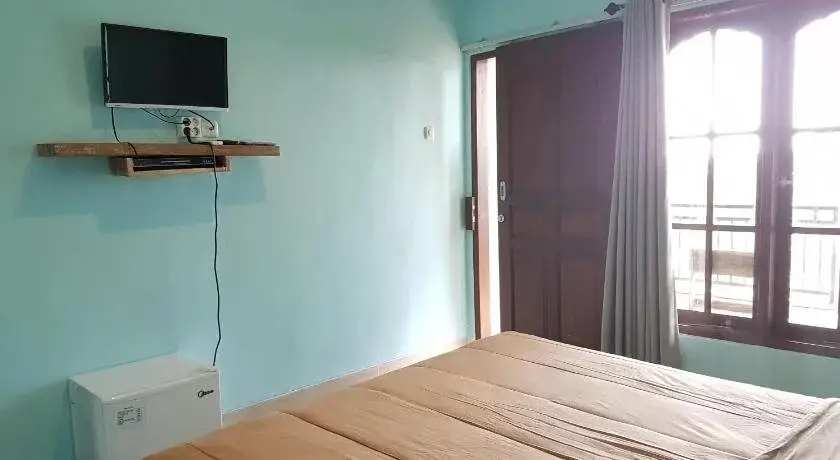 Чангу: Koming Guest House