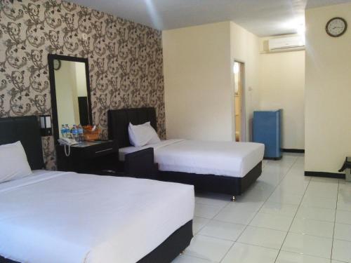 Джембер: Seven Dream Syariah Hotel