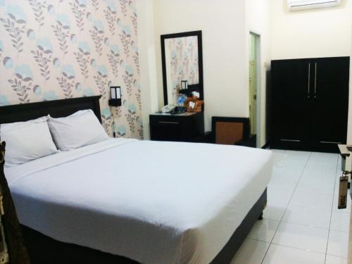 Джембер: Seven Dream Syariah Hotel