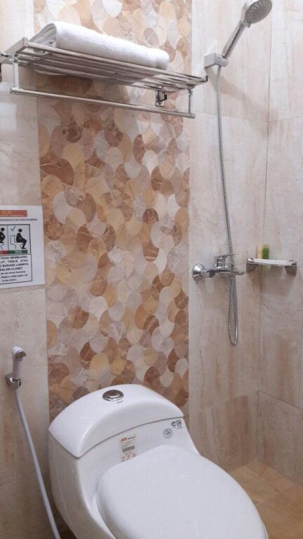 Сурабая: Nugraha Homestay