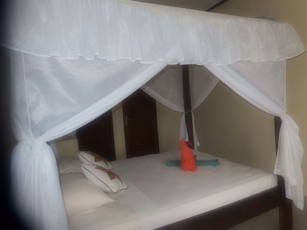Бунутан: Titi Sedana Homestay