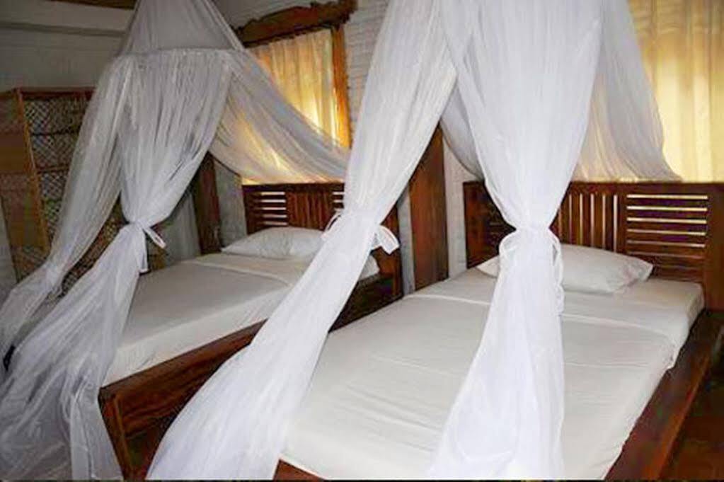Мундук: Puri Sunny Guesthouse