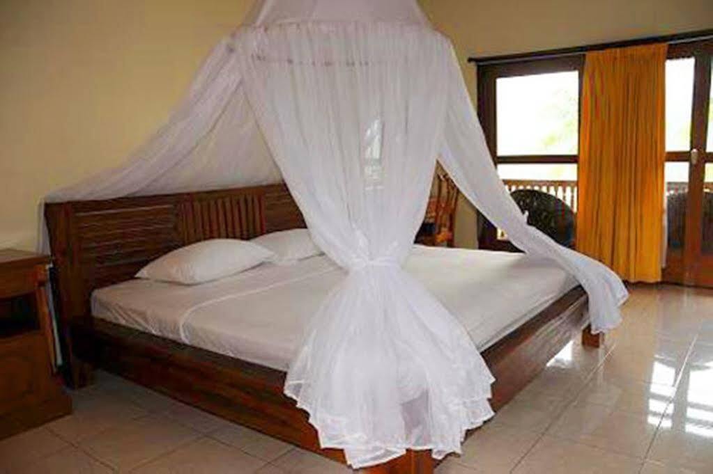 Мундук: Puri Sunny Guesthouse