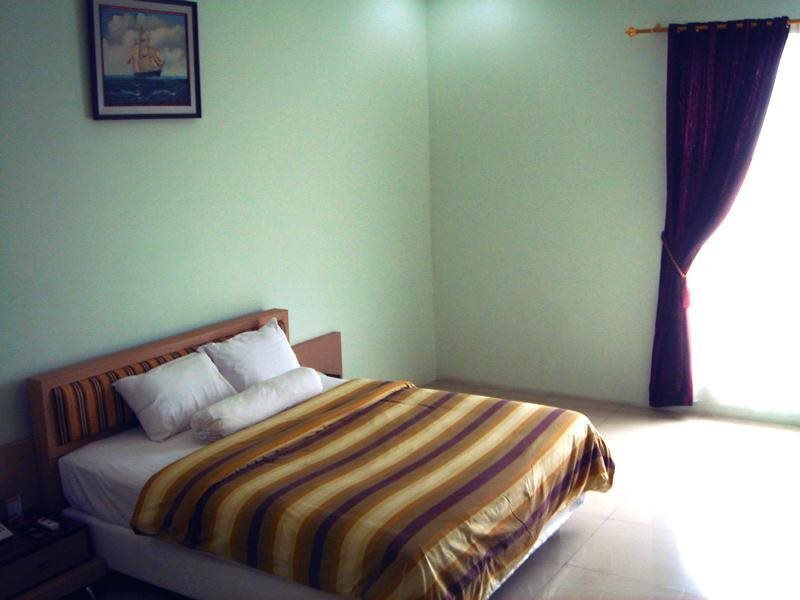 Джамби: Golden Harvest Hotel