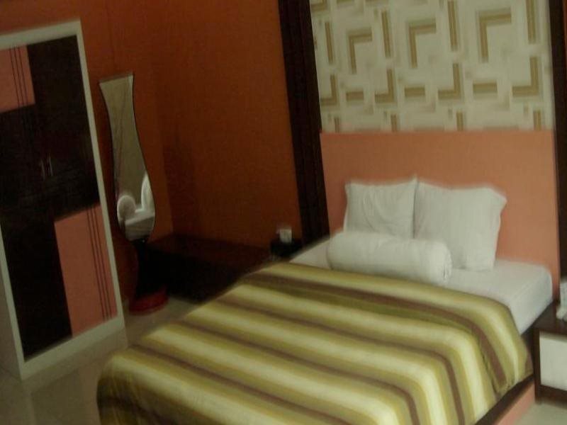 Джамби: Golden Harvest Hotel