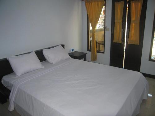 Пемутеран: Pondok Dhevika Hotel