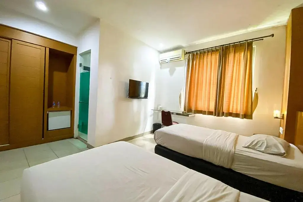 Джамби: Cosmo Hotel