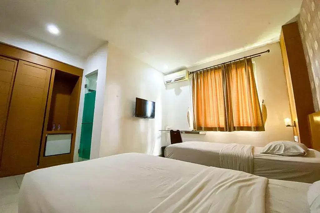 Джамби: Cosmo Hotel