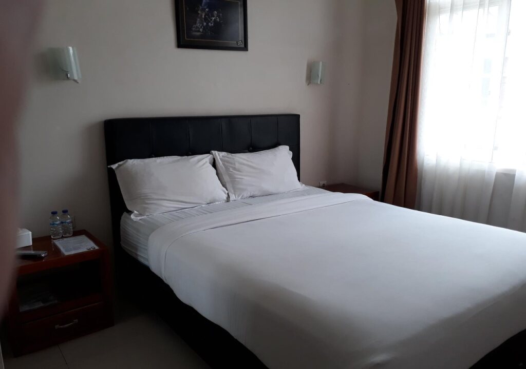Маланг: Hasanah Guesthouse Sawojajar