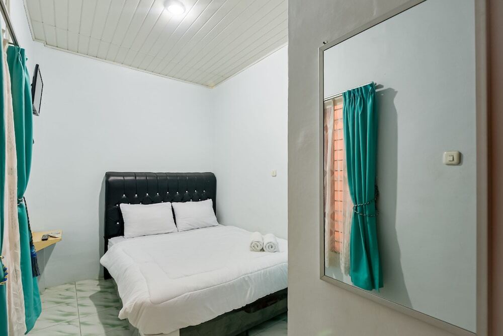 Медан: Vandolia Guest House RedPartner