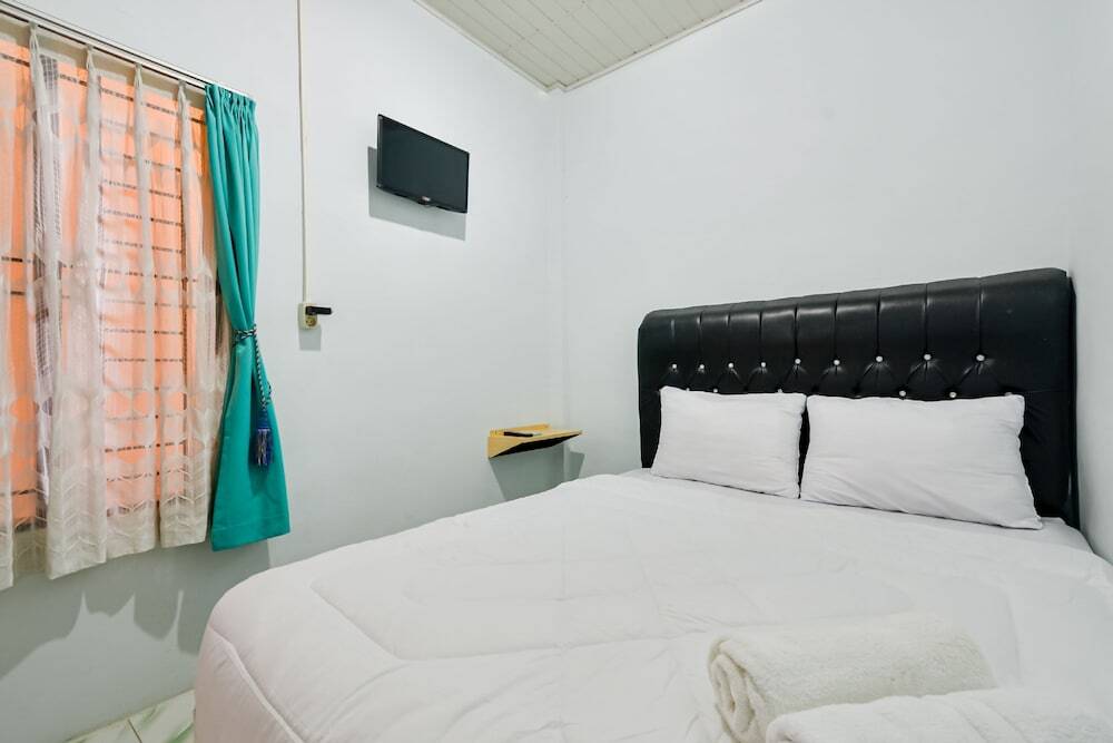 Медан: Vandolia Guest House RedPartner