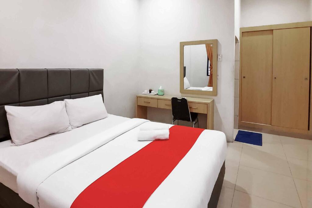 Медан: Vandolia Guest House RedPartner