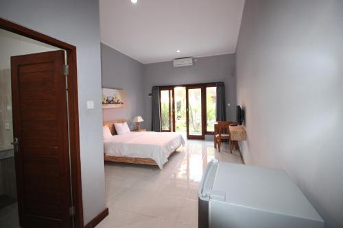 Кута: Kubu Manik Homestay
