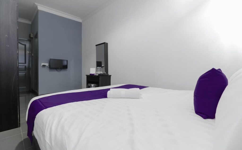 Батам: Cosmopolitan Guesthouse