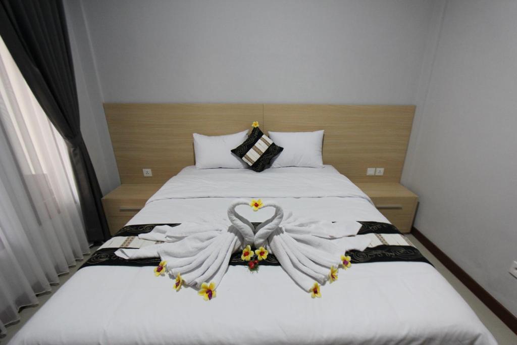 Кута: Tom Guest House