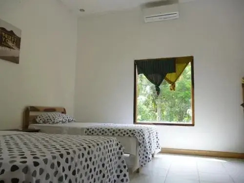 Кута: Dewi Garden Guesthouse
