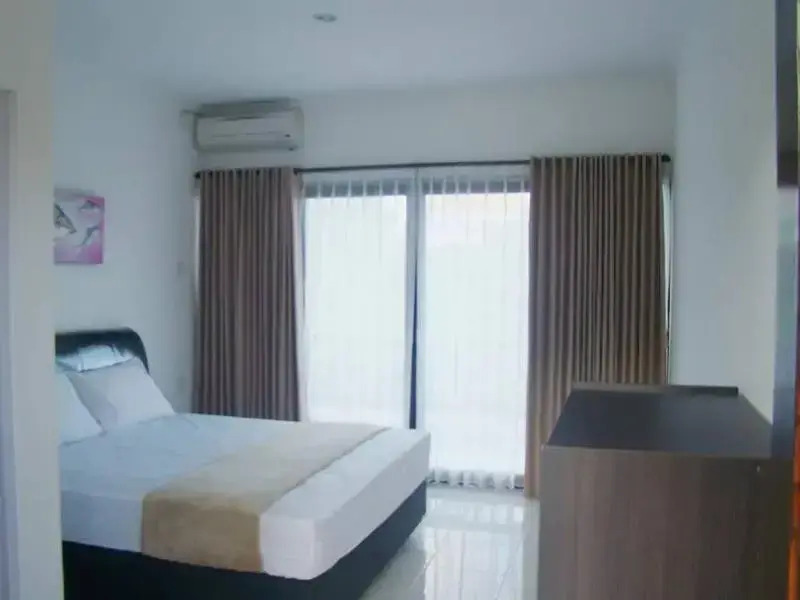 Унгасан: Akasia Kozy Guest House