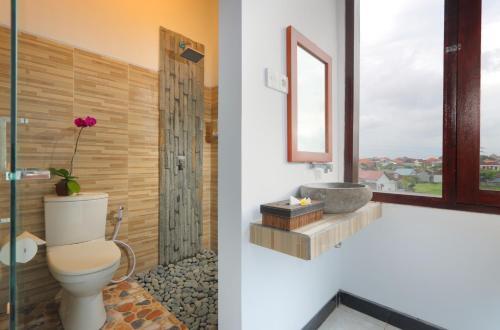 Падангсамбиан: Valomia Guest House