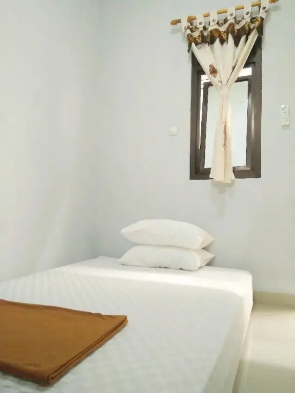 Бангунтапан: Adikarta Guesthouse Janti