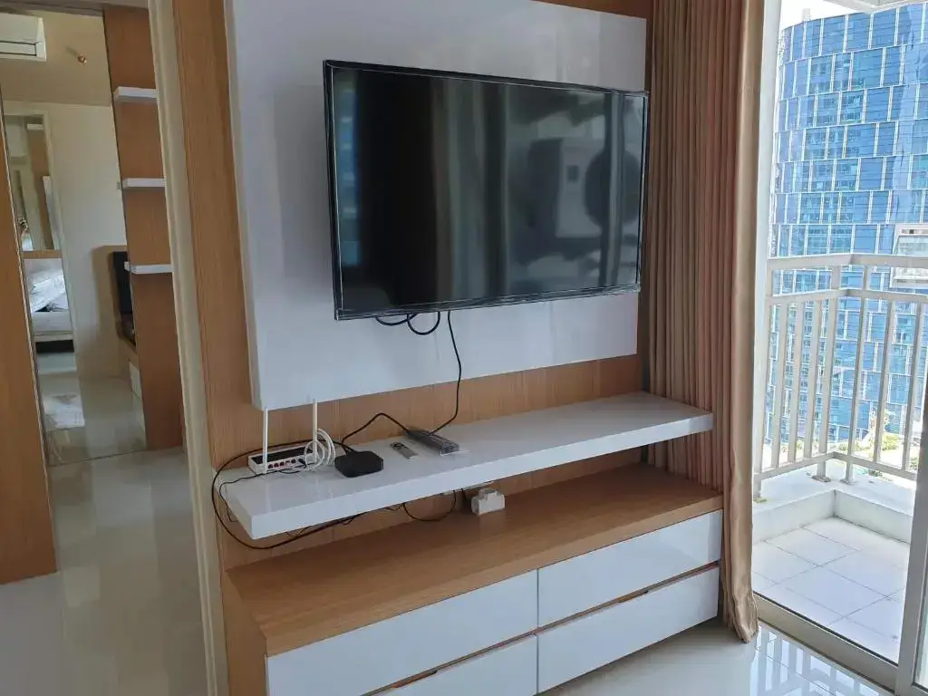 Сурабая: Cosmy Tanglin Apartment