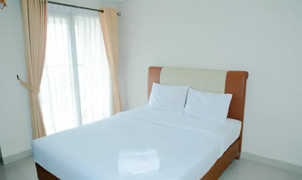 Legok: Simply Studio Room Atria Residence Apartment near Summarecon Mall By Travelio