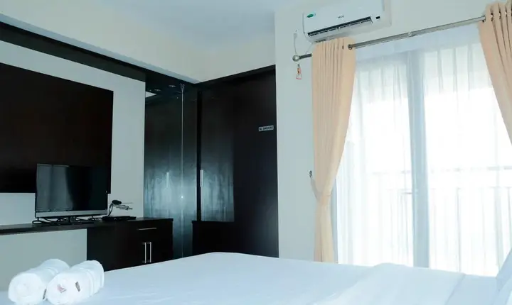 Legok: Simply Studio Room Atria Residence Apartment near Summarecon Mall By Travelio