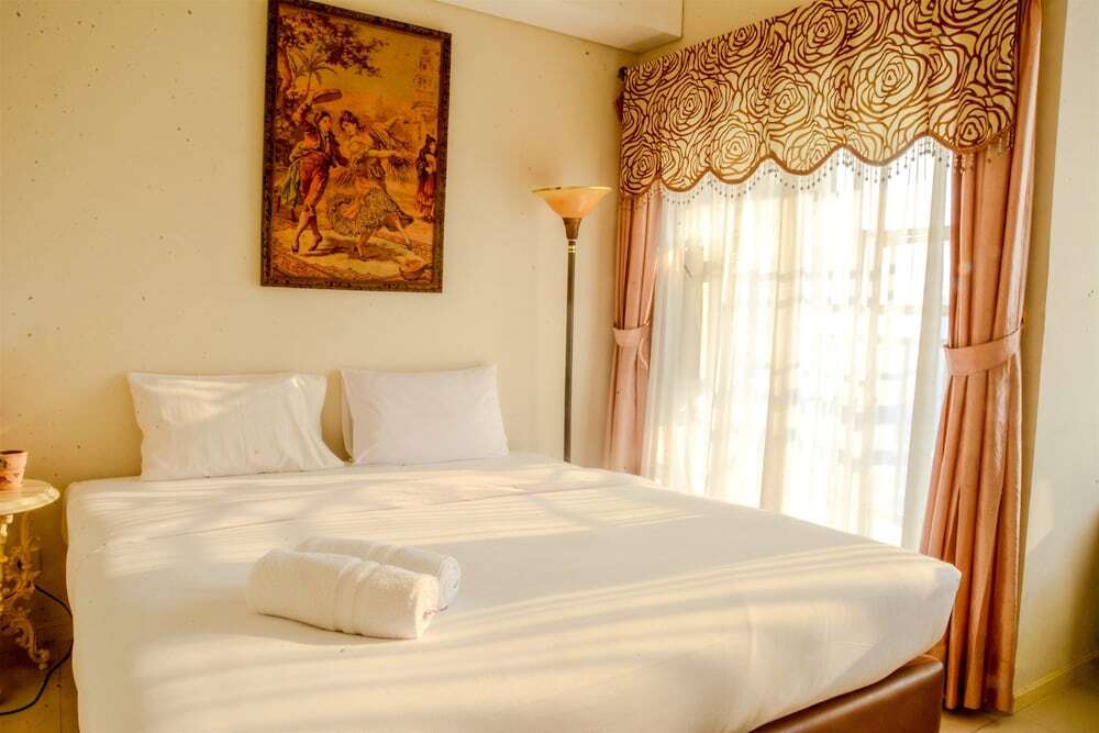 1 Vintage Bedroom at Cosmo Terrace Apartment by Travelio — фото 1