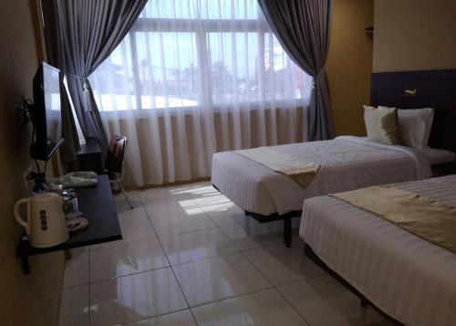 Петумбак: Hotel AERO