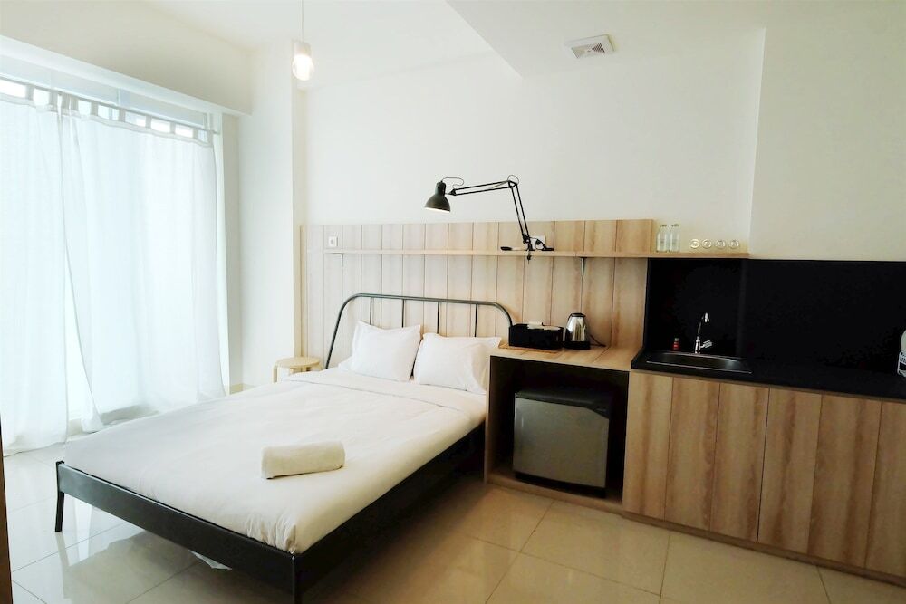 Южный Тангеранг: Classic Studio Tree Park Apartment near ICE BSD By Travelio