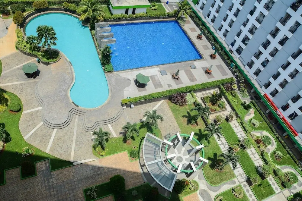 Южный Тангеранг: Parquette Studio Green Lake Apartment near Ciputat By Travelio