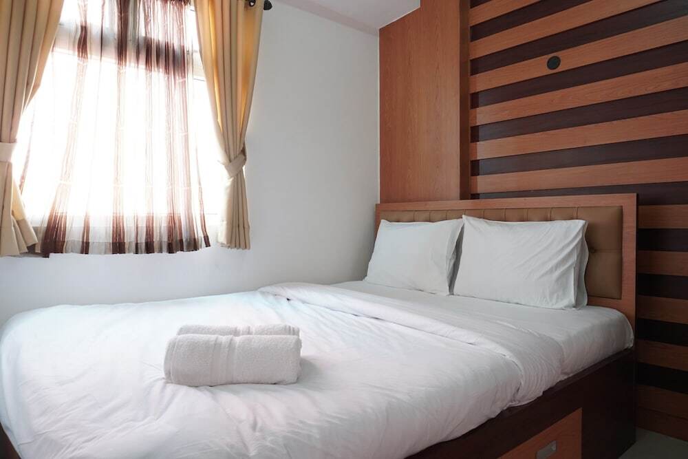 Джакарта: Homey and Warm 2BR Green Pramuka Apartment