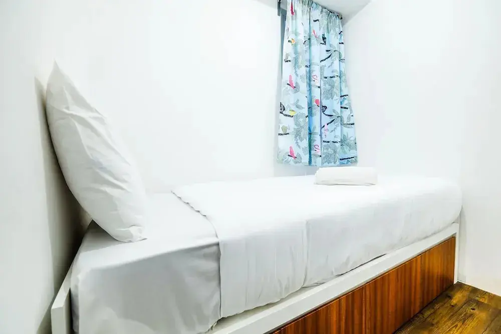 Джакарта: Modern And Comfy 3BR Bassura City Apartment