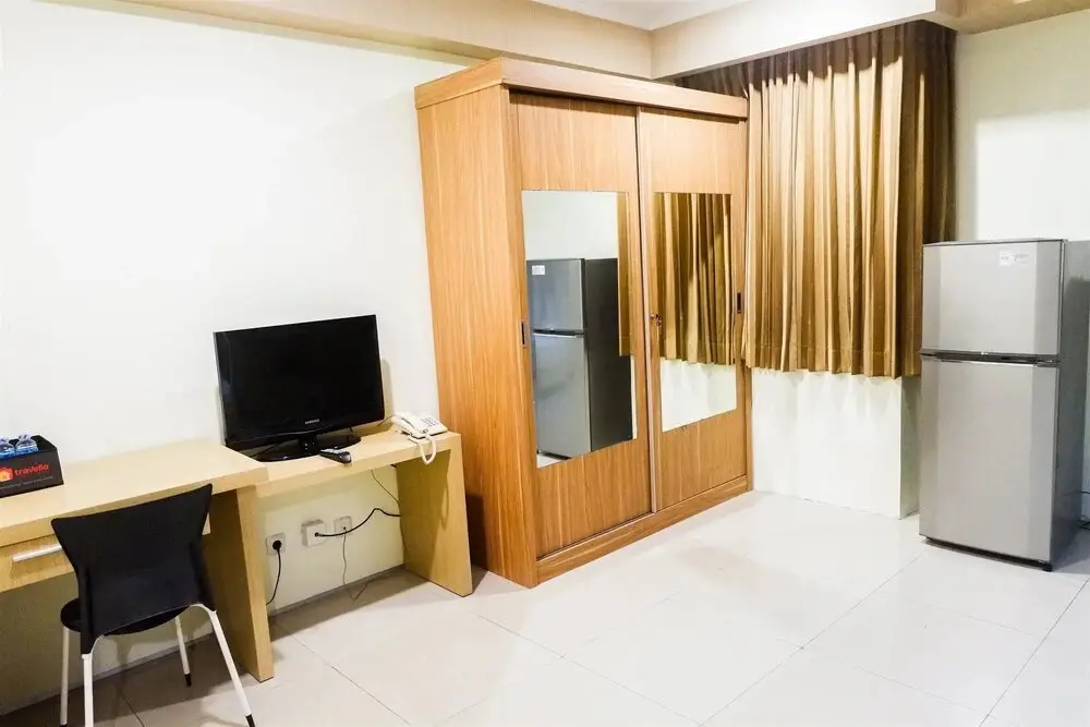 Сурабая: Homey 1BR at High Point Serviced Apartment
