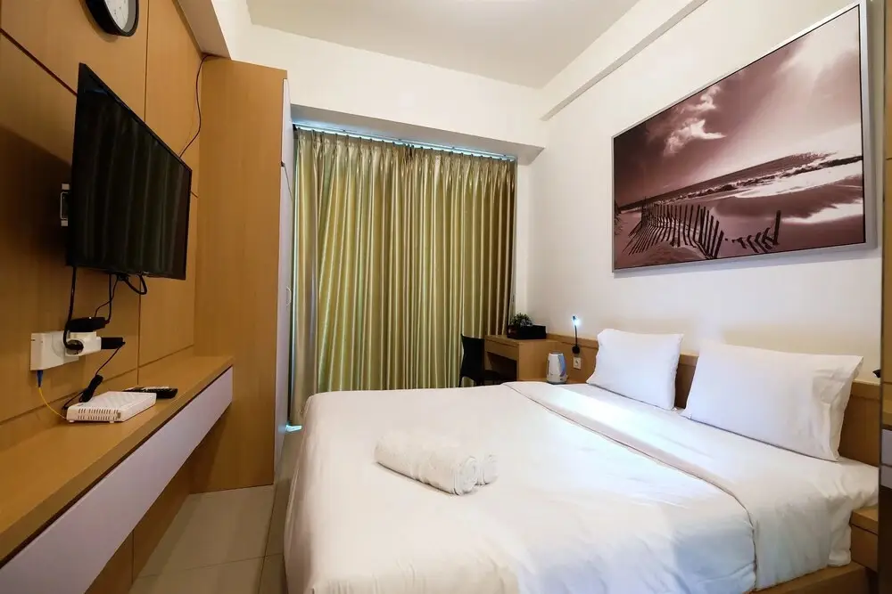 Homey Studio Room Tree Park Apartment near BSD City By Travelio — фото 1