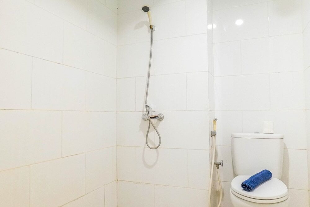 Сурабая: Homey 2BR at Waterplace Residence