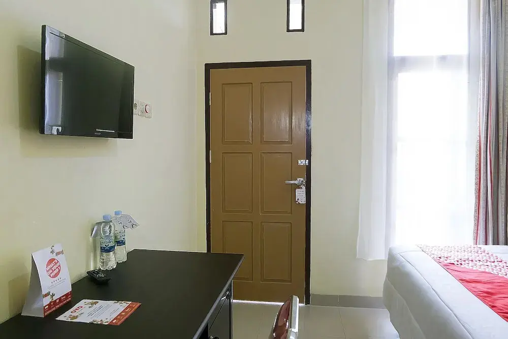 Джамби: OYO 1126 Trio R Kost Syariah