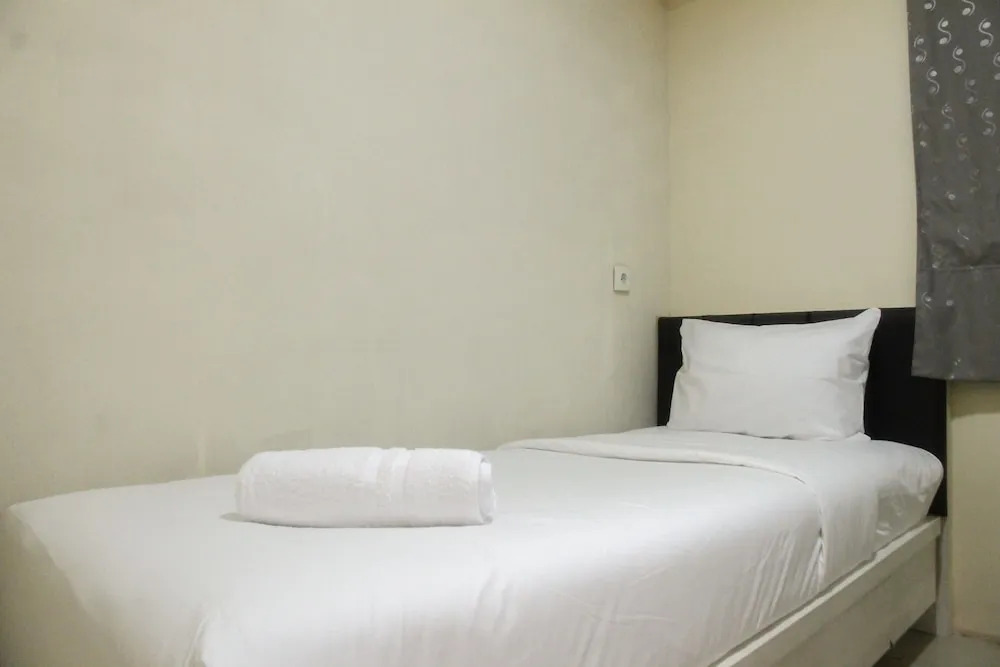 Джакарта: Simply Minimalist 2BR Apartment at Green Palace Kalibata