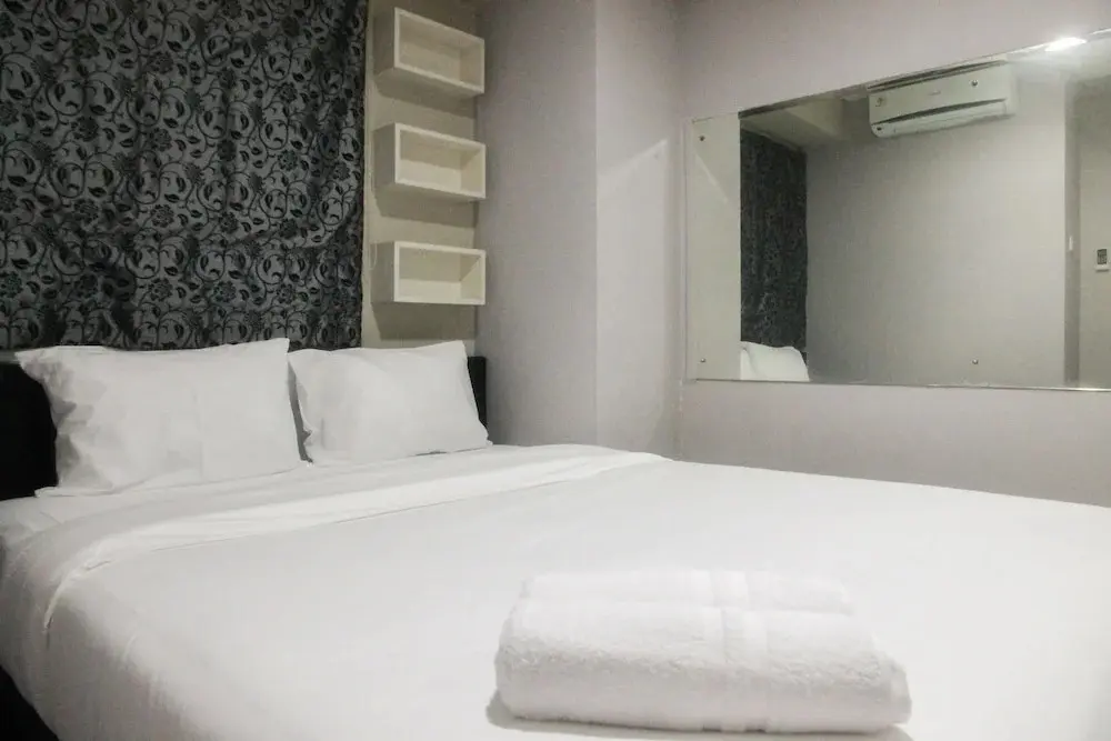 Джакарта: Simply Minimalist 2BR Apartment at Green Palace Kalibata