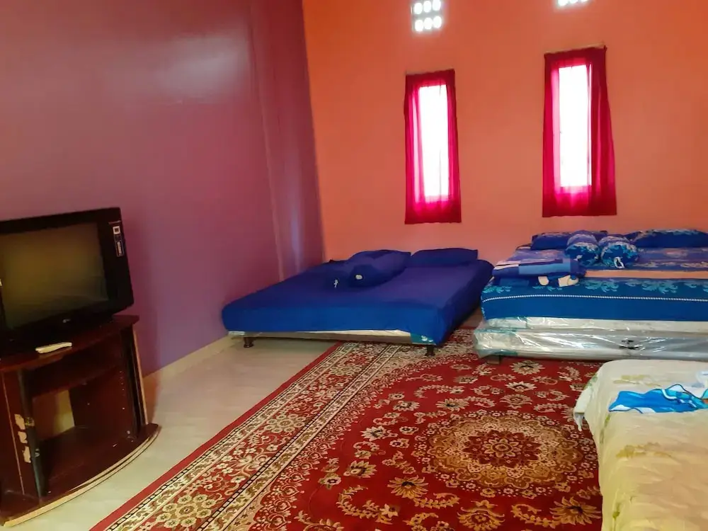 Джамби: Almira Homestay