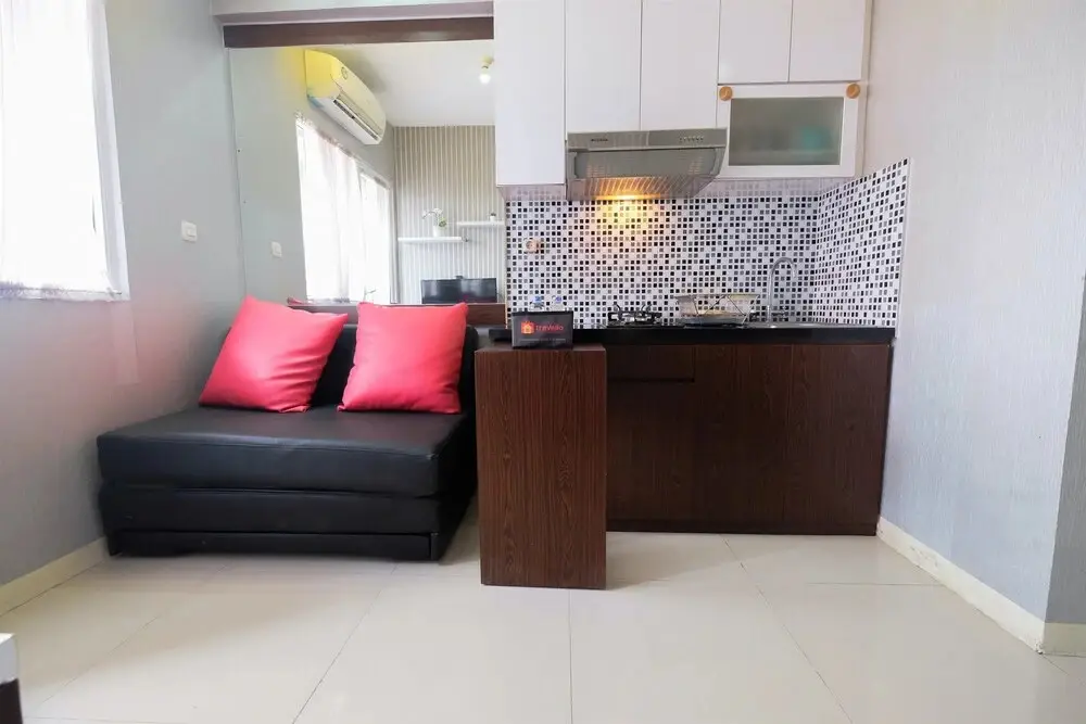 Homey and Relaxing 2BR Green Pramuka Apartment — фото 1
