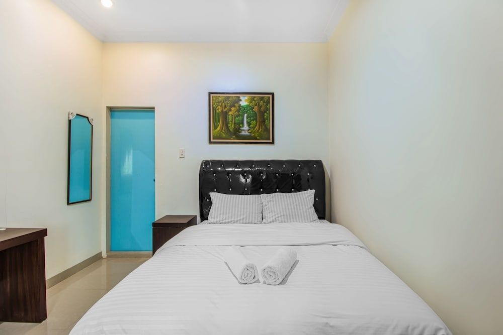 Медан: De Coco Guesthouse